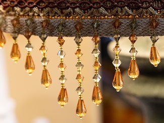 Detail of a Beautiful Beaded Lampshade with gold and clear crystals