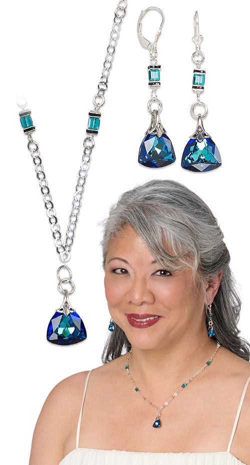 Model wearing necklace and earrings made with crystal passions pendants