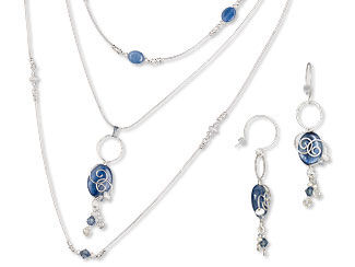 An image of a multi strand necklace and earrings with kyanite beads and chain