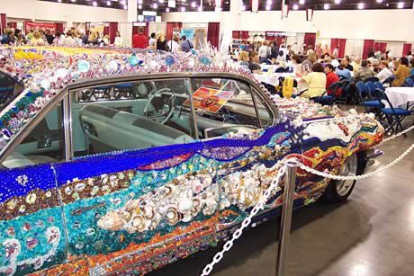 Side view of Cadillac in a meeting hall