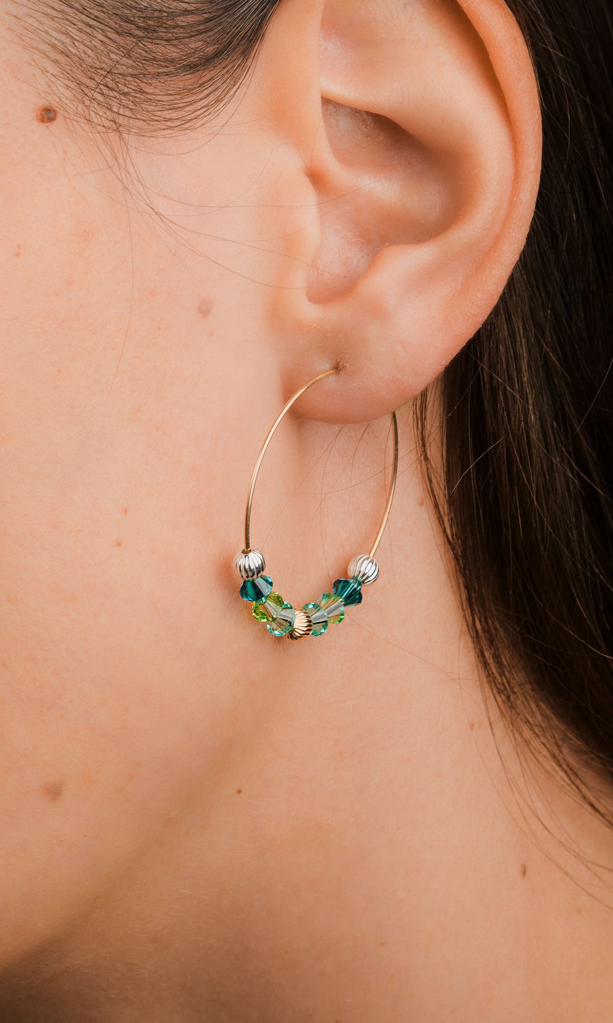 earring hanging from left earlobe