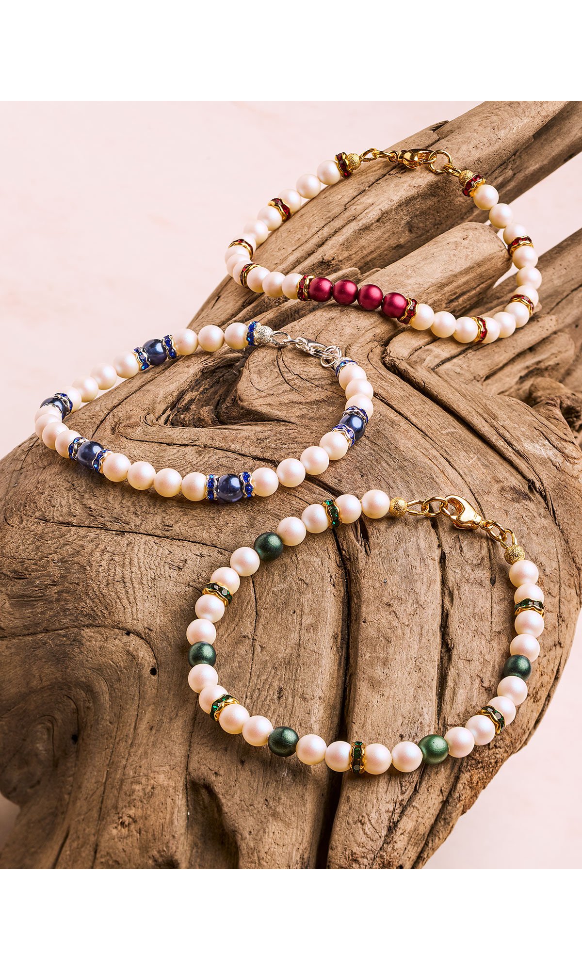 Design Idea R F 3 E: Set of three bracelets using crystal pearls and rhinestone rondelle beads set in a pleasing pattern for display purposes 