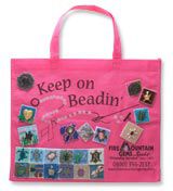 Reusable bag with beaded quilt squares