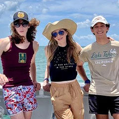 Three people on a boat