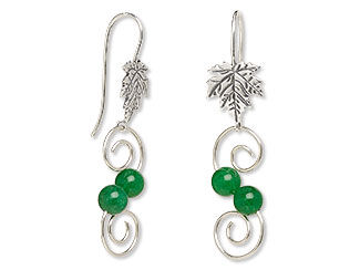An image of a pair of earrings that are slightly wire wrapped with 2 green malaysia "jade" beads