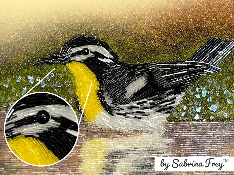 bead mosaic showing a fox in snow