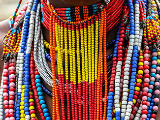 Close-up of a woman from the Arbore tribe with traditional jewelry, Omo valley, Ethiopia.