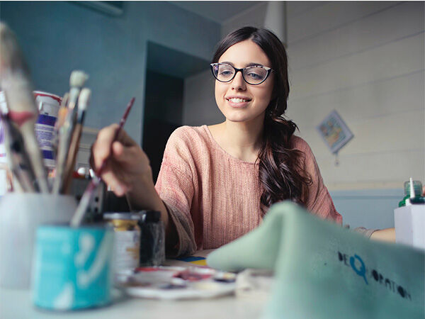 Woman using a paintbrush