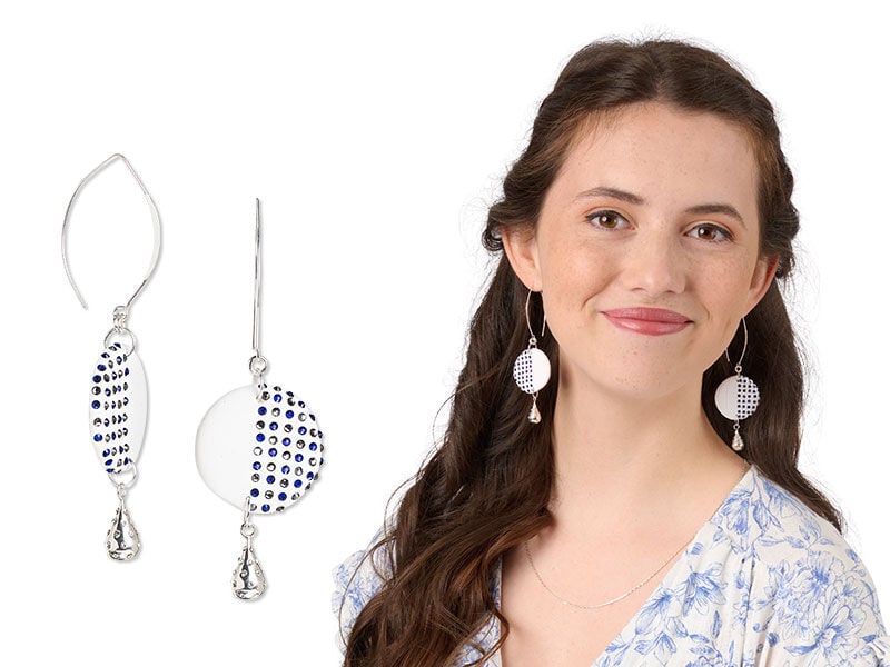 Model wearing earrings with flat back rhinestones