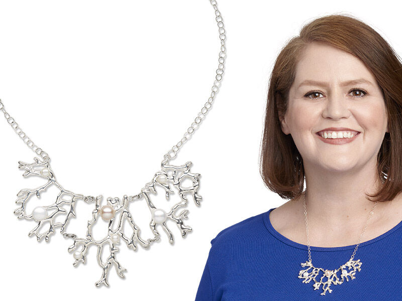 Model wearing a metal clay necklace