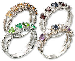 Four multi-stone rings