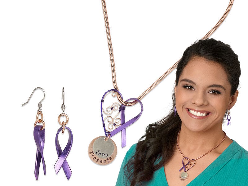 Model wearing awareness jewelry