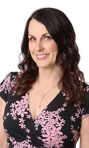 model in floral dress wearing design idea R J 2 9 chain lariat style necklace with pink crystal beads