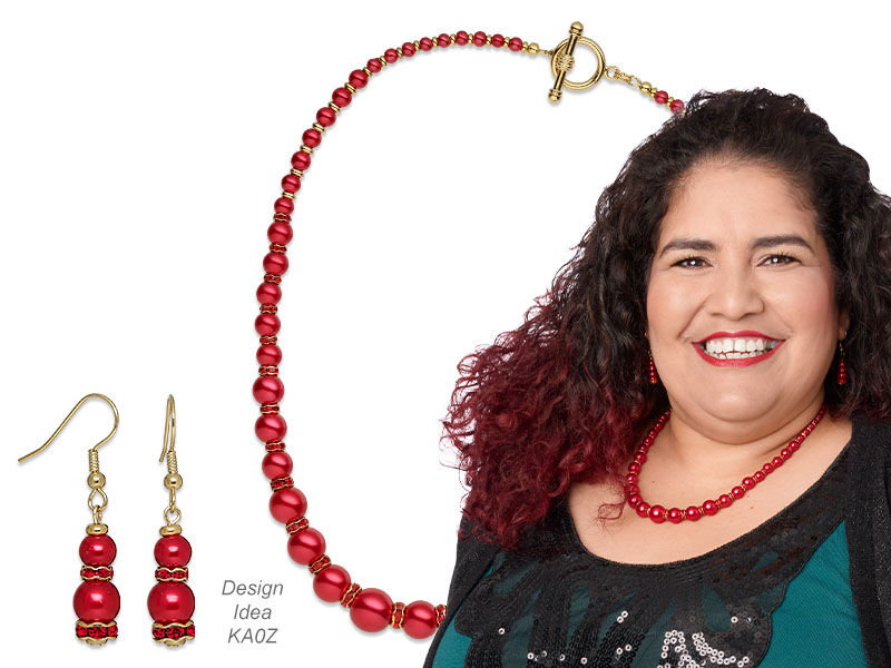 An image of a model wearing a pearl necklace