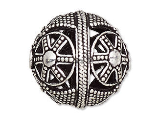 Silver bead with wheel-like patterns