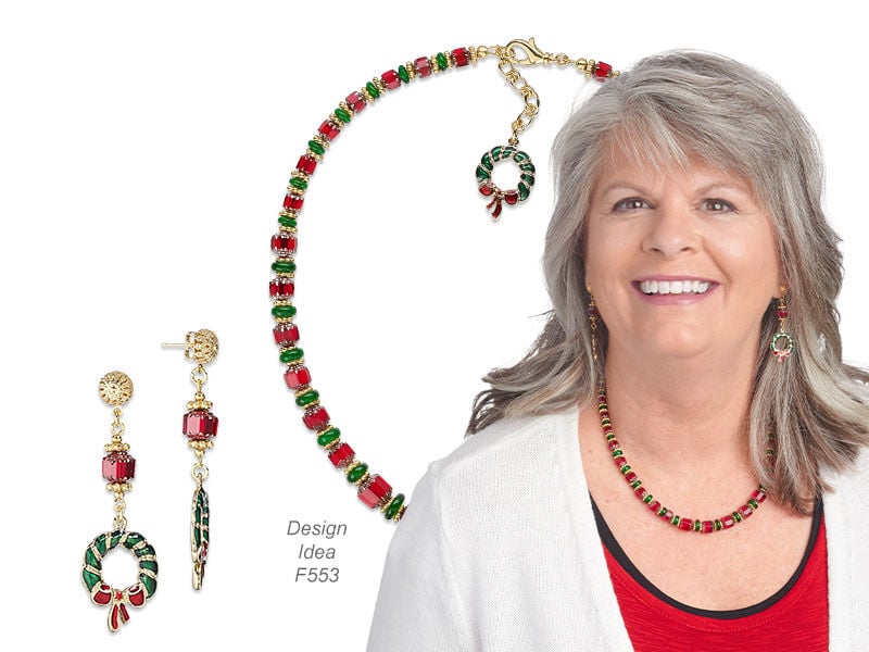 Model wearing a necklace and earrings made with glass beads