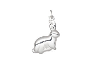 Silver charm of a rabbit facing to the right with its ears up