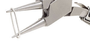 Pliers stretching out a soldered jump ring