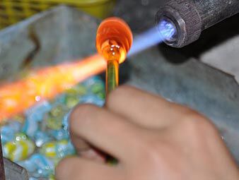 Heating glass with a torch