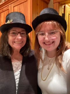 Chris and Caitlyn wearing top hats