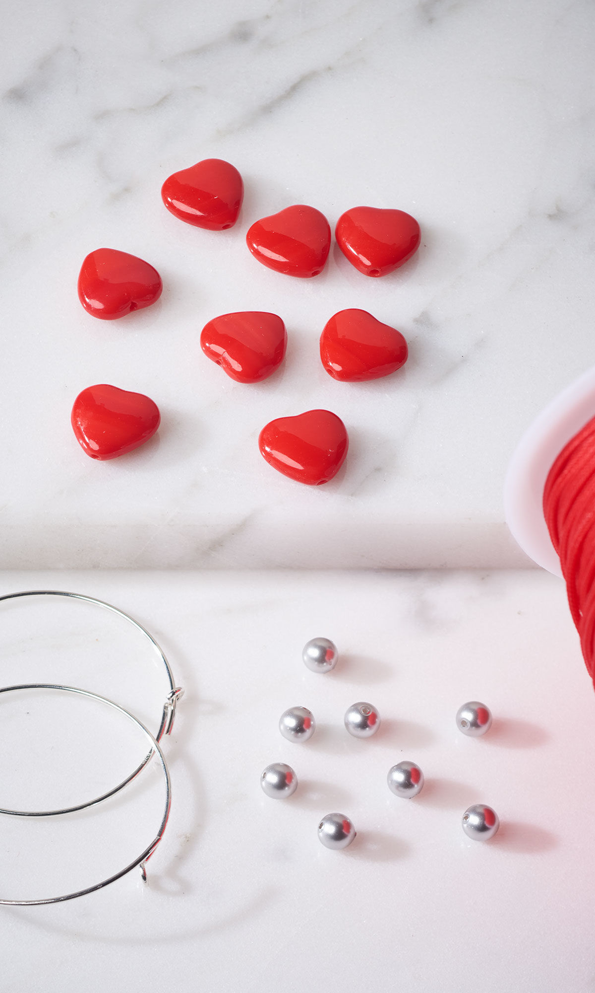 Assorted beads and components on marble