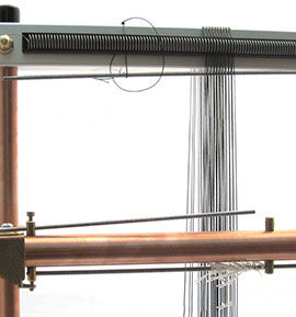 Step 34 - Remove heddle bar partway