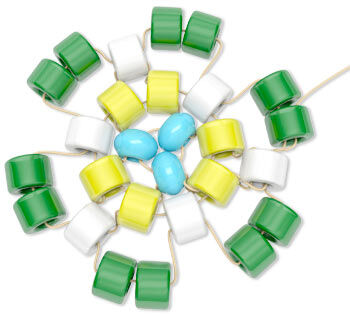 Adding in green beads