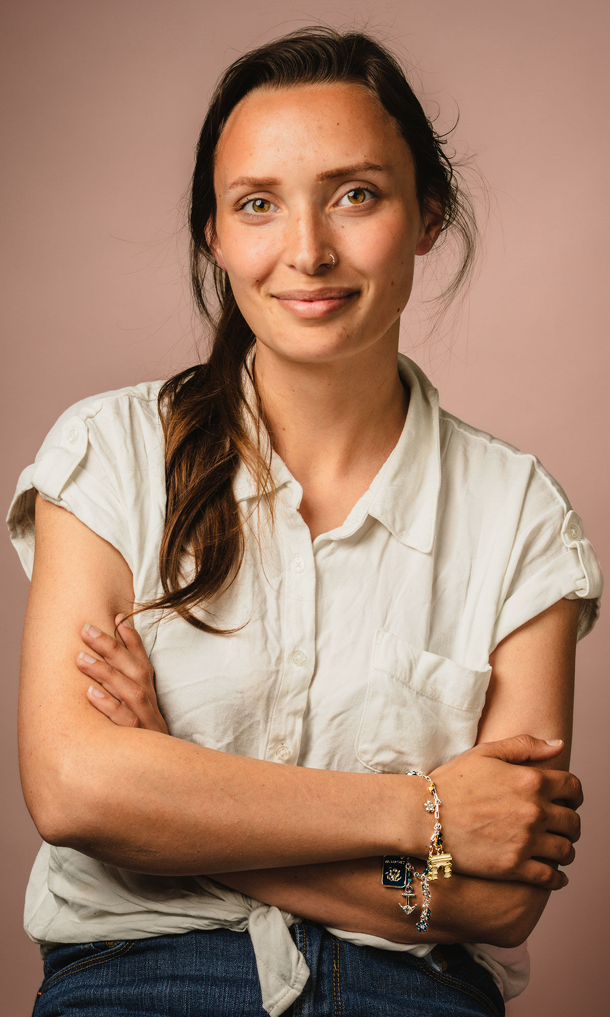 A smiling woman wearing Design Idea R D 3 Q