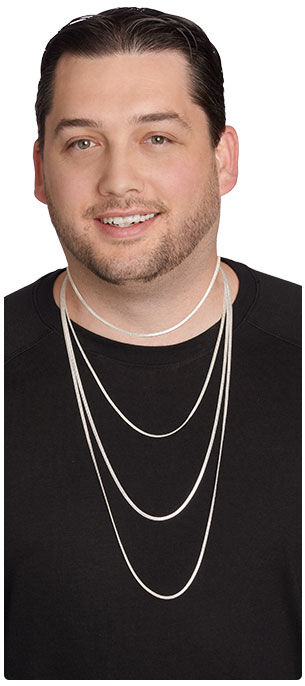 Man modeling various necklace lengths