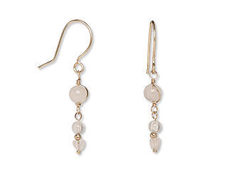 Image of earrings with rose quartz beads and wireworking