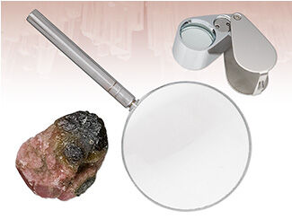 magnifying glass and rock