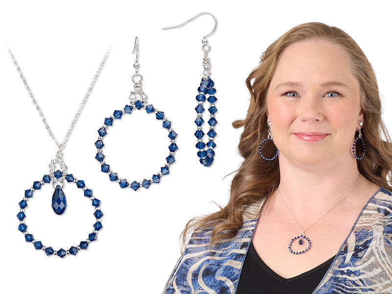 Model wearing necklace and earring made with sapphire colored crystal beads