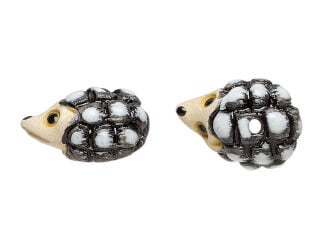 Side and top view of a ceramic hedgehog bead in cream, white and grey
