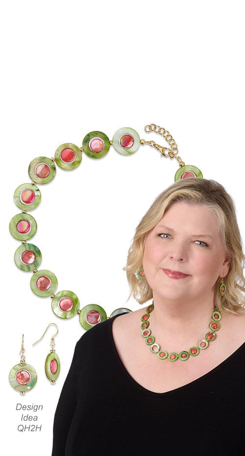 Model wearing a bracelet made with shell beads