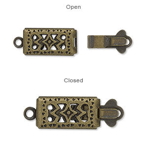 Open and closed filigree clasp