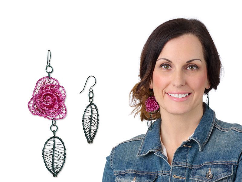 Model wearing asymmetrical wire wrapped earrings