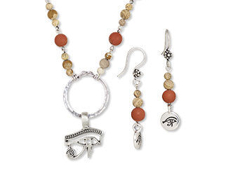 An image of a necklace and earrings made with red and picture jasper and charms