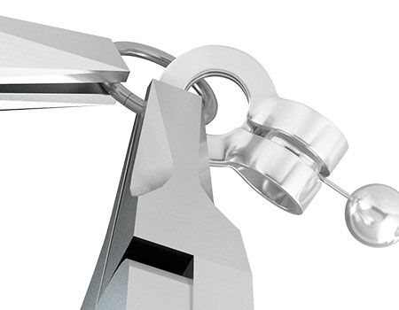 Pliers holding a ball change connector