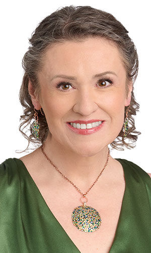 Model wearing Design Idea N E 3 A Single-Strand Necklace and Earring Set with Crystal Passions® Flat Backs and Metal Sheet