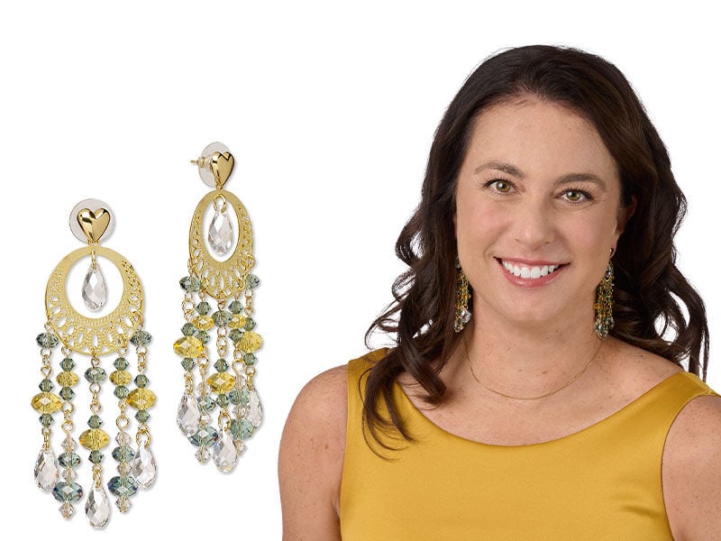 Model wearing jewelry using head and eye pins