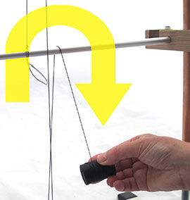 Step 9 - Warping thread goes around the bar