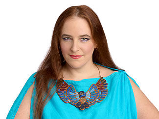 Woman wearing Egyptian-style bird polymer clay necklace M H 4 3 colored like lapis and bronze, wings outspread
