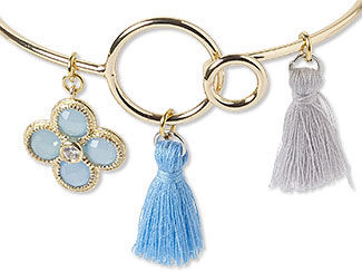 A bracelet with a chalcedony component as a charm and tassels