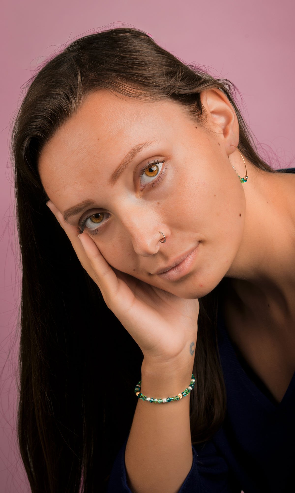 model wearing bracelet and earring