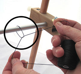 Step 5 - Tying the warping thread to the warping bar