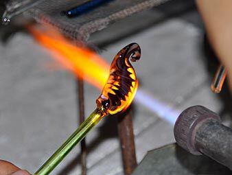 Partially shaped glass being heated