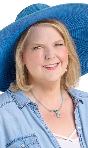 A woman with a blue hat wearing Design Idea R B 2 D