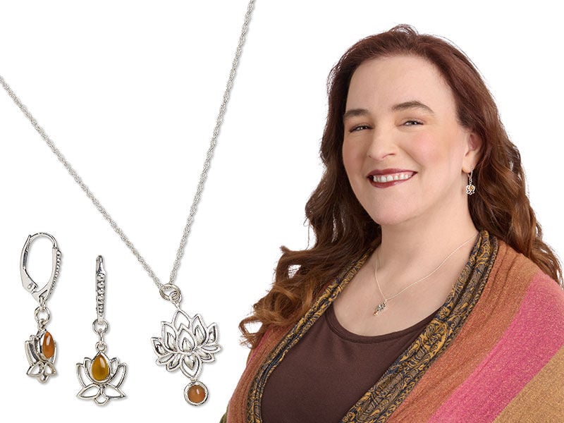 Image of a model wearing a necklace with a lotus drop