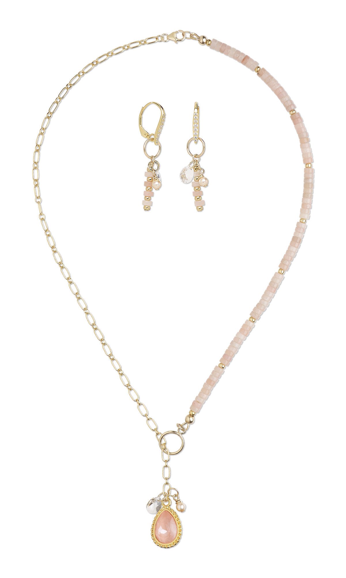 Design Idea R N 2 H – Gold necklace has a pear-shaped drop with a pink crystal stone. Two drops are on the sides of the drop, one with a clear crystal and one with tiny pink gemstone beads. Earrings have delicate drops featuring a clear crystal, a peach pearl, and tiny pink gemstone beads.