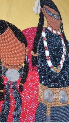 beaded figures of native people
